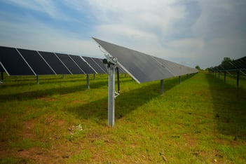 Solar panels line a farm in Lee County, Georgia that power a data center for Meta in Atlanta.