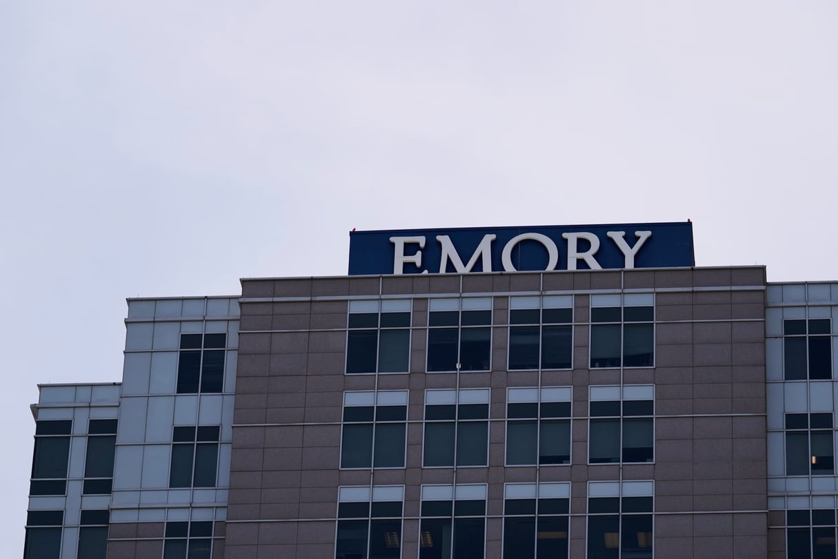 The top of an Emory hospital building with Emory's name on top.