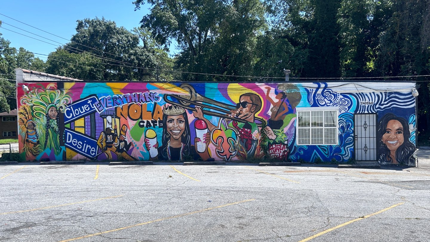 A mural filled with New Orleans icons.