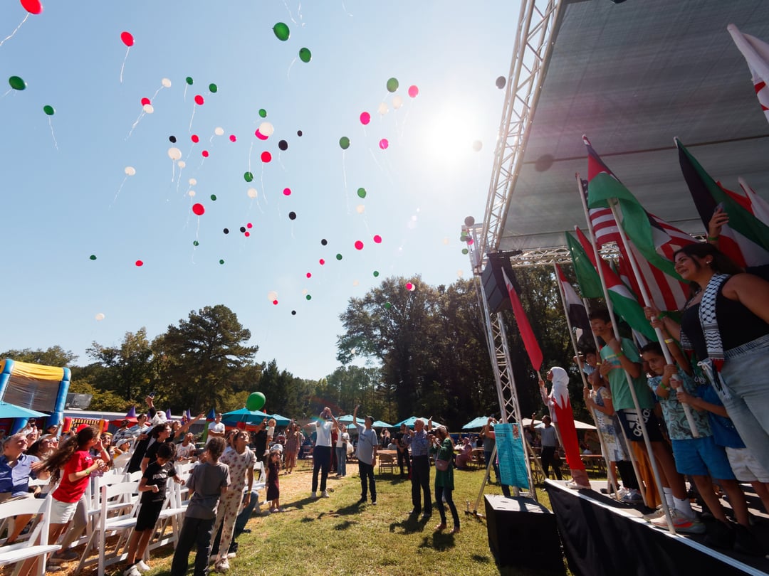 Performers and community members gather at the Atlanta Arab Festival.