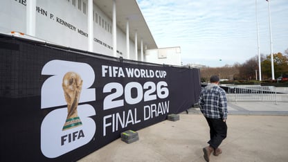 A sign stretched across a fence advertising the 2026 FIFA World Cup