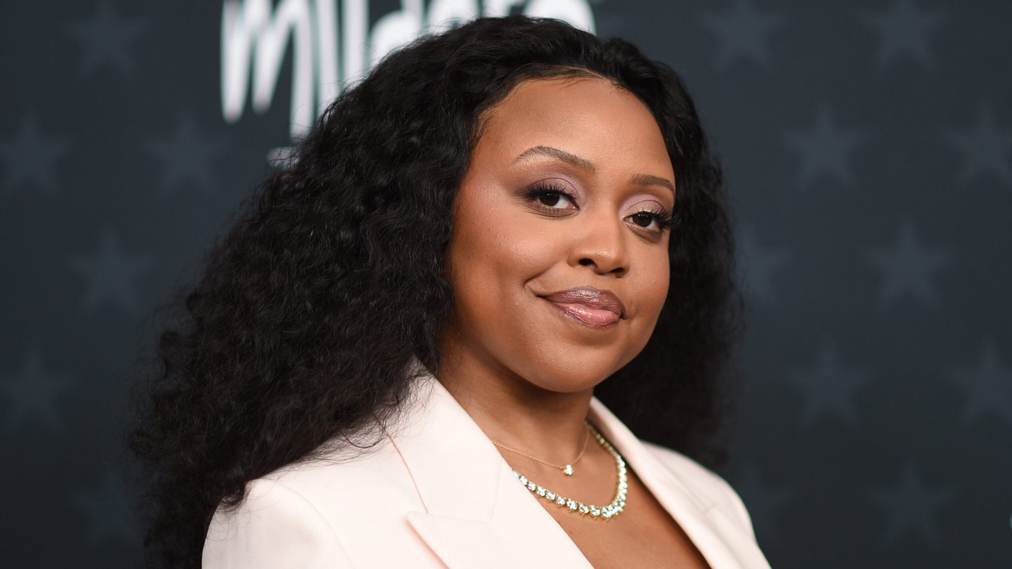Quinta Brunson poses for a photo at an event.