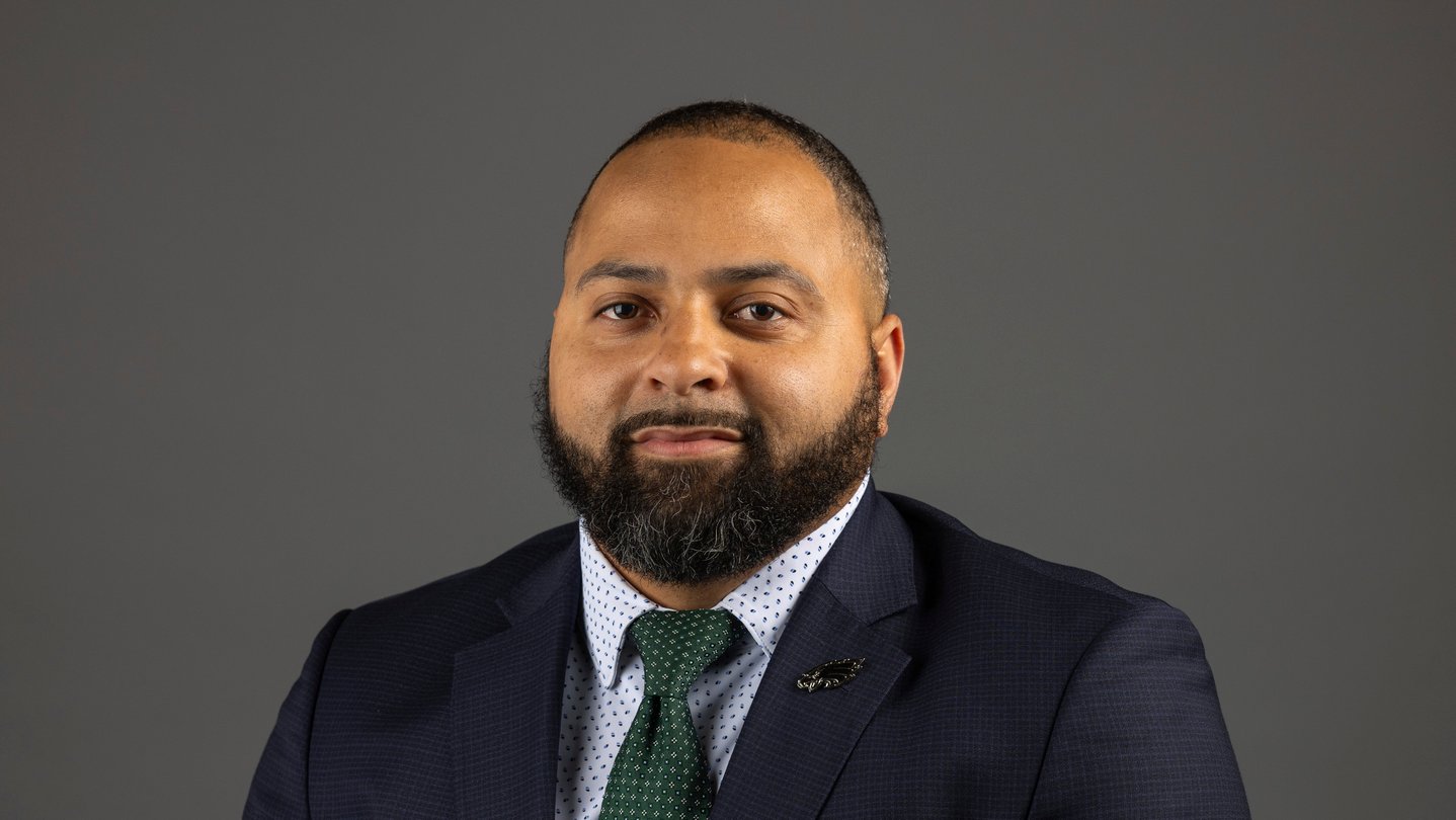 Jeff Scott stands for a professional headshot