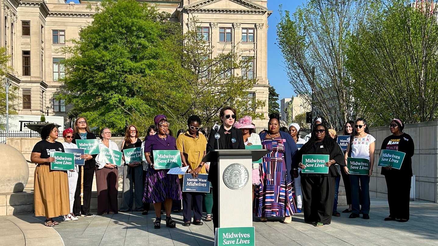 A group of Georgia midwives and reproductive health care advocates announced the lawsuit outside the state Capitol on the last day of the legislative session (JESS MADOR/WABE)
