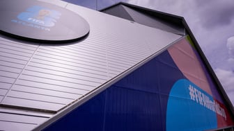 The side of a large stadium with World Cup branding