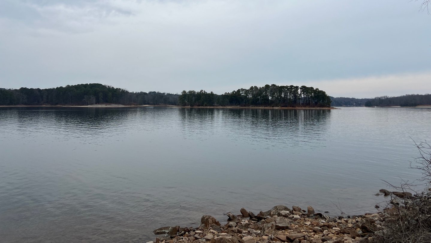 A large lake with the outline of an island in the distance