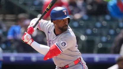A baseball player ready to hit a ball