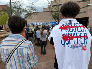 A group of protesters at a protest against data centers