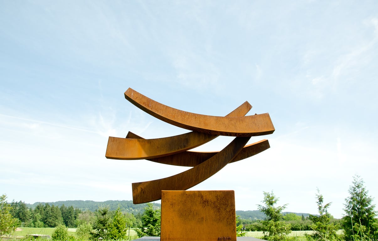 This Luxury Resort Nestled in Oregon’s Lush Wine Valley Is a Serene Escape | The Allison Inn & Spa exterior | The Allison Inn & Spa bedroom | The Allison Inn & Spa suite | The Allison Inn & Spa pool | The Allison Inn & Spa restaurant | The Allison Inn & Spa outdoor patio