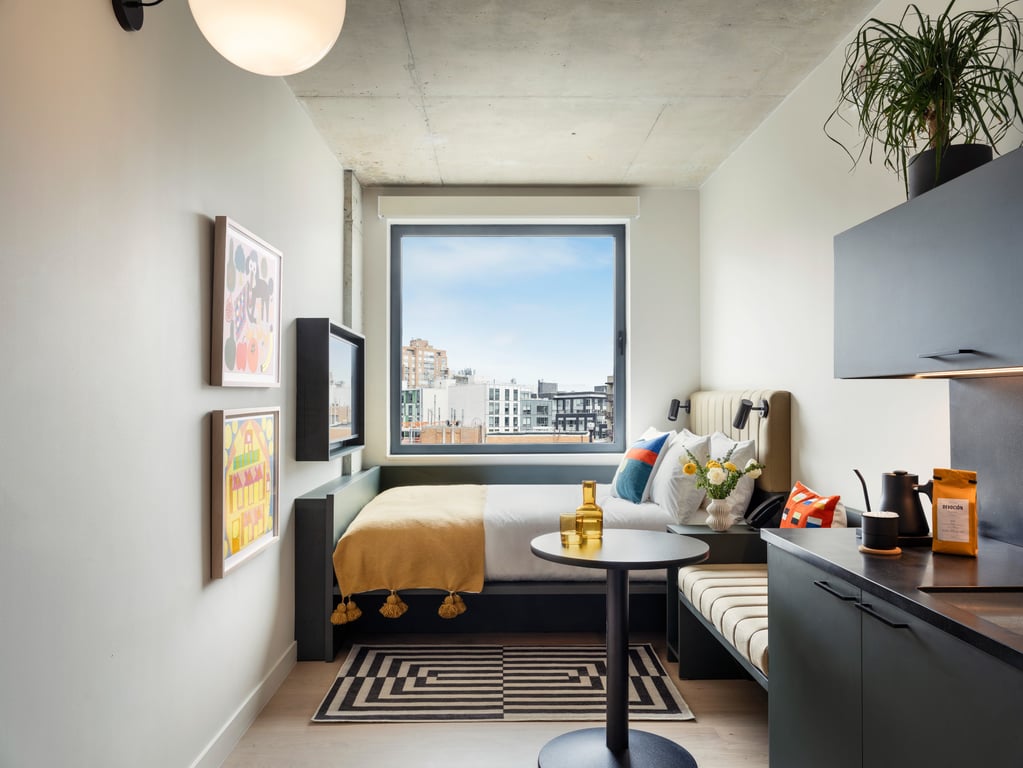 This Art-Focused Boutique Hotel in Brooklyn Sports an Incredible Rooftop | Penny Williamsburg lobby | Penny Williamsburg entrance | Penny Williamsburg suite bedroom | Penny Williamsburg suite kitchen | Penny Williamsburg restaurant | Penny Williamsburg outdoor patio