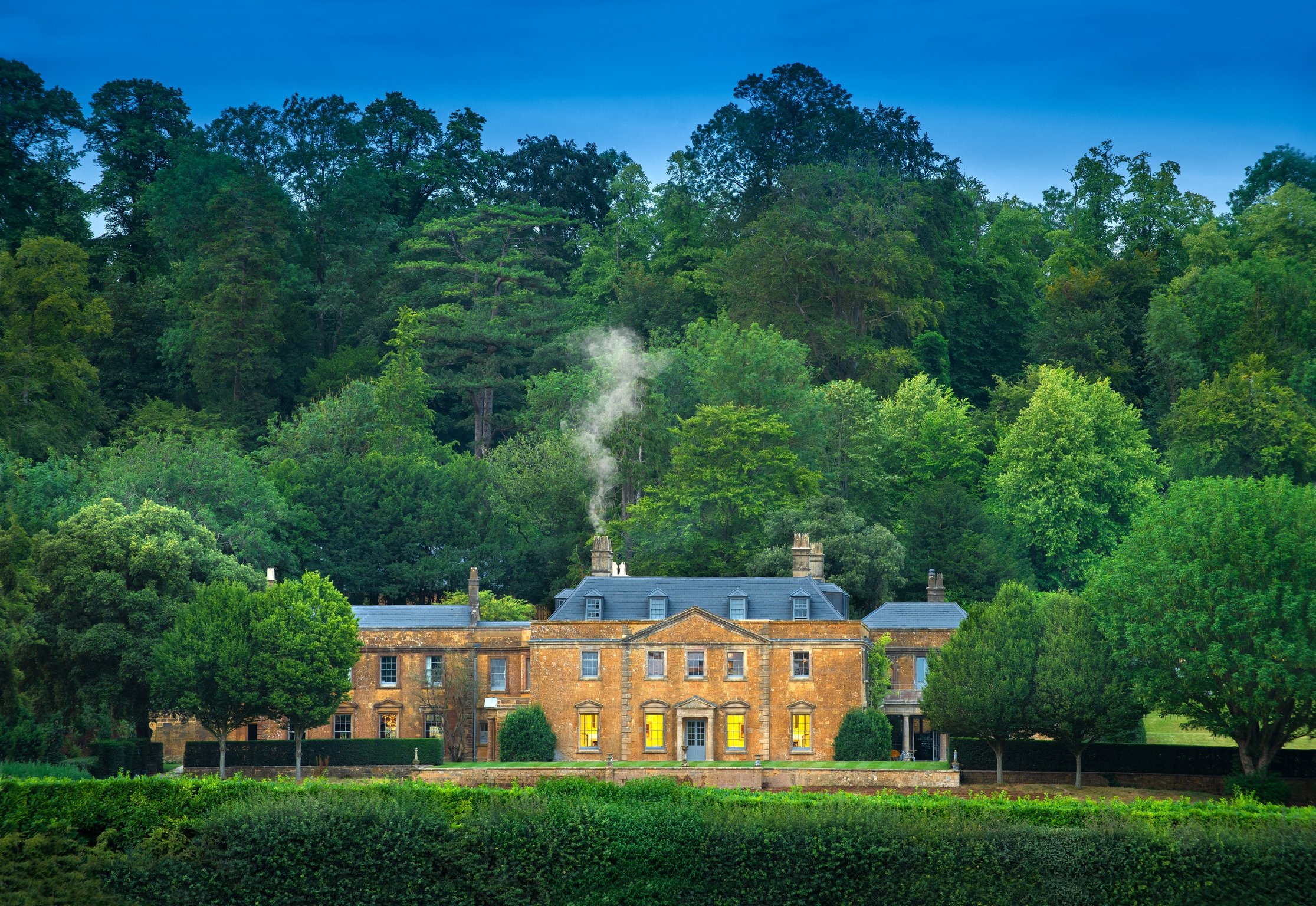The Newt in England’s Somerset Countryside Is in a League of Its Own | The Newt hotel exterior entrance | The Newt hotel interior | The Newt hotel lobby | The Newt hotel bedroom suite | The Newt hotel courtyard | The Newt hotel restaurant dish | The Newt hotel bar