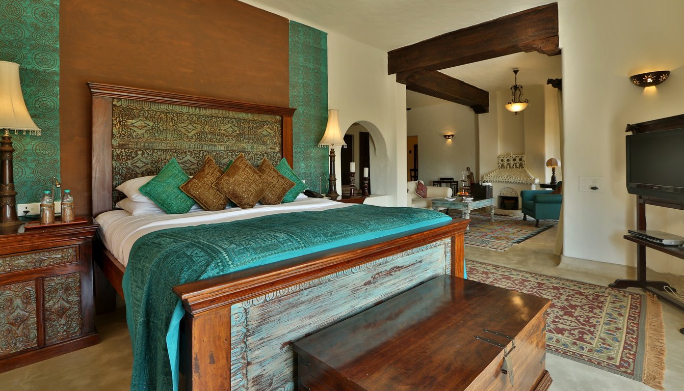 This Nine-Suite Desert Fortress in India’s Rajasthan Makes Every Guest Feel Like Royalty | Mihir Garh entrance | Mihir Garh bedroom suite | Mihir Garh private pool | Mihir Garh outdoor pool | Mihir Garh side profile