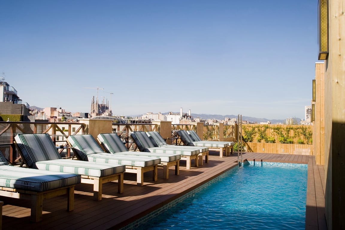 This Former Textile Headquarters Is Now Barcelona’s Most Charming Stay | Cotton House, Autograph Collection exterior | Cotton House, Autograph Collection interior | Cotton House, Autograph Collection bedroom | Cotton House, Autograph Collection restaurant