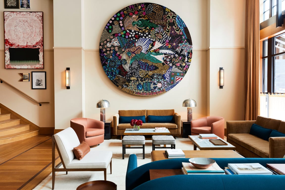 This Luxury Boutique Hotel Is Known As “Detroit’s Living Room” | Shinola Hotel exterior | Shinola Hotel front desk | Shinola Hotel lobby | Shinola Hotel bedroom | Shinola Hotel bathrobe | Shinola Hotel restaurant seating | Shinola Hotel restaurant bar