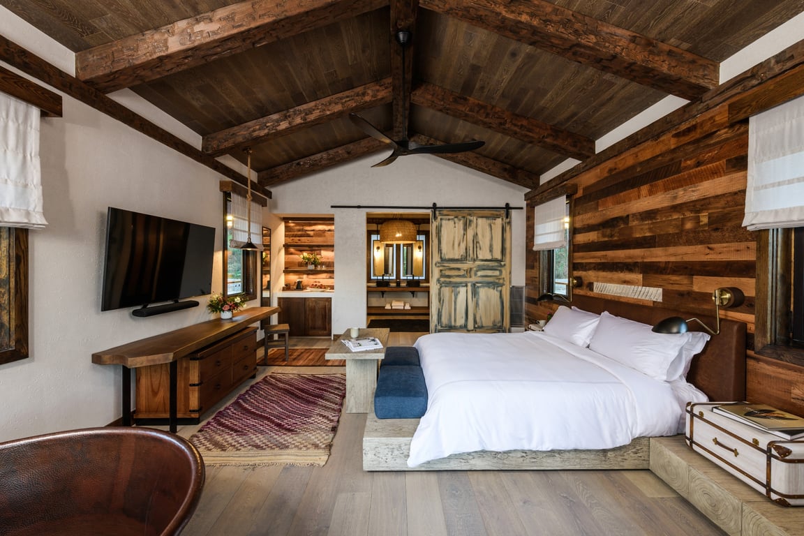 This Inn Unveils a New Era of Luxury Hospitality in the Rolling Hills of Middle Tennessee | Southall Inn & Farm Exterior of Event Center and Lake Mishkin | Southall Inn & Farm Hillside One-Bedroom Cottage | Southall Inn & Farm pool | Southall Inn & Farm exterior view