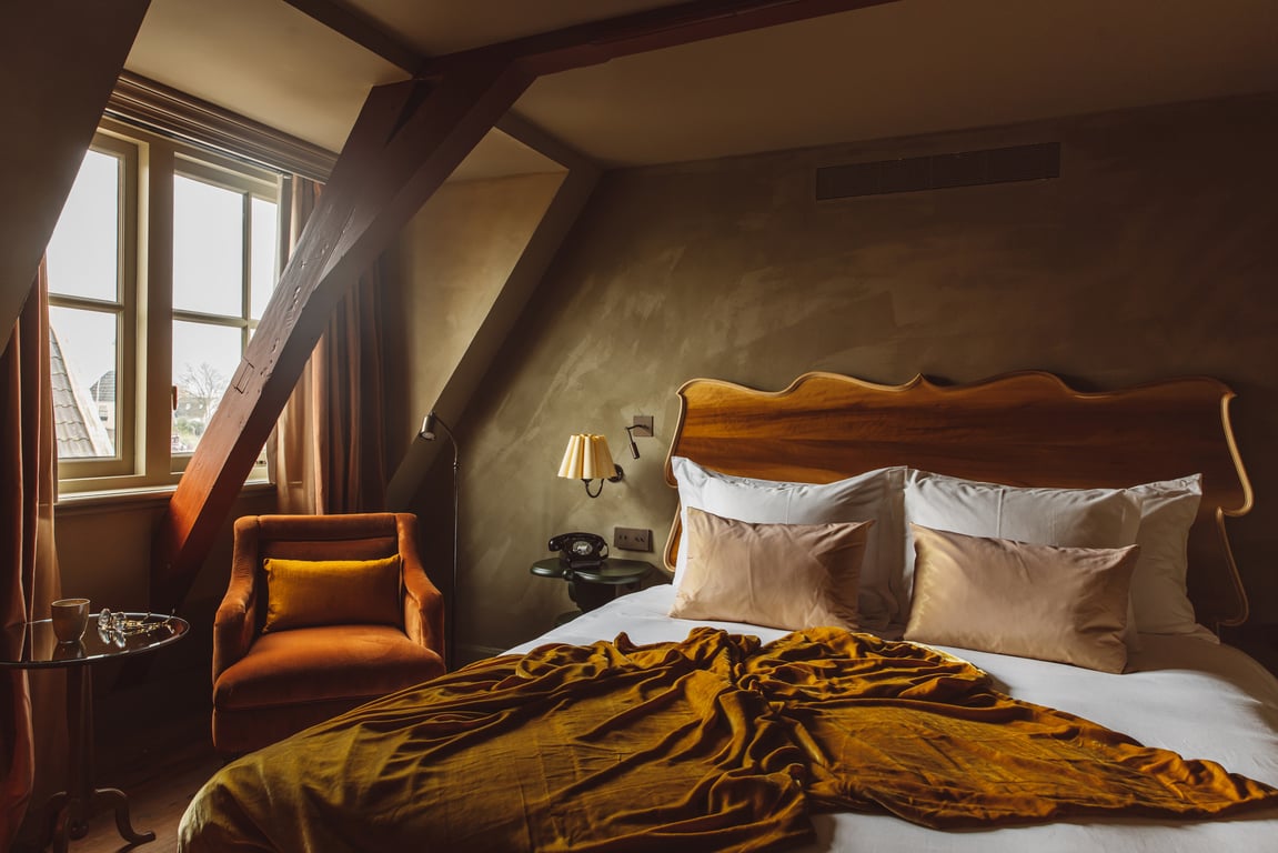 Hotel Review: De Durgerdam (Amsterdam) | De Durgerdam seating area | De Durgerdam fireplace and couch | CREDIT-Chantal-Arnts | De-Durgerdam_Special-Room_De-Ziel | De-Durgerdam_Suite_De-Maan_Living | De-Durgerdam_Suite_De-Maan_Bathroom | De-Durgerdam garden | De_Durgerdam bedroom | De Durgerdam living room | De Durgerdam seating | De Durgerdam restaurant | De Durgerdam garden | De Durgerdam bedroom