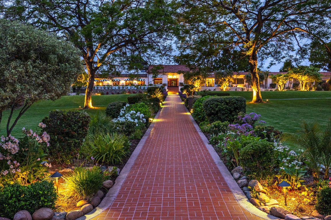 This Elegant Boutique Hotel Near San Diego Debuts a Fresh New Look | Inn at Rancho Santa Fe outdoor pool | Inn at Rancho Santa Fe lobby | Inn at Rancho Santa Fe bedroom suite