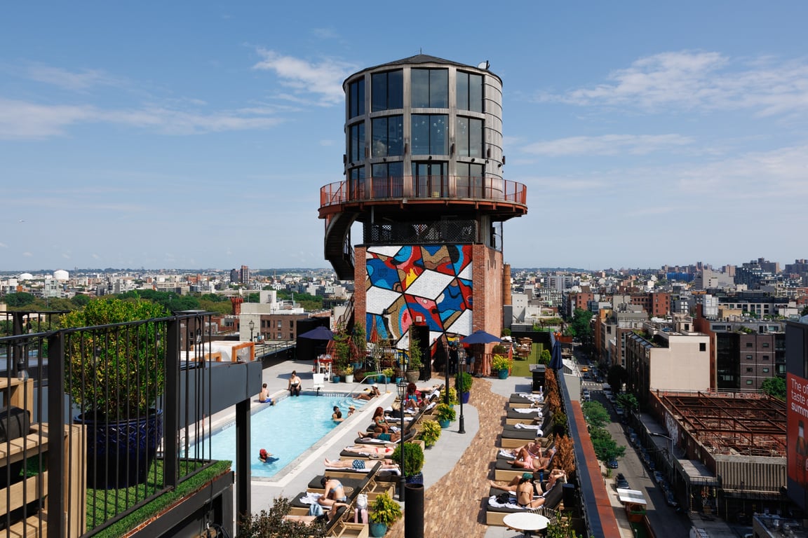 This Art-Centric Hotel Group Now Boasts a New Oasis in the Heart of Williamsburg, Brooklyn | Arlo Williamsburg hotel exterior | Arlo Williamsburg hotel lobby | Arlo Williamsburg bedroom suite | Arlo Williamsburg bathroom | Arlo Williamsburg restaurant dessert