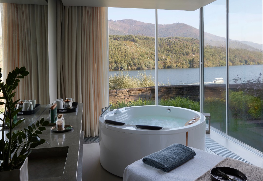 This Minimalist Hotel in Porto Offers Breathtaking Views of The Douro River | Octant Douro Valley pool view | Octant Douro Valley living room | Octant Douro Valley spa | Octant Douro Valley dining | Octant Douro Valley Lovers' Island