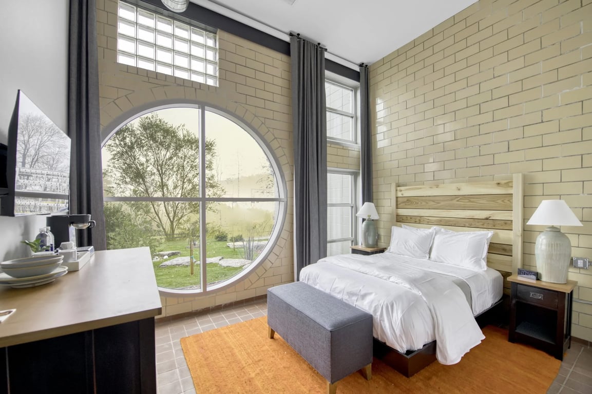 Channel your Inner Milkmaid at This Dairy Factory Turned Boutique Inn in Wisconsin | Inn at Seven Acre bedroom suite | Inn at Seven Acre restaurant | Inn at Seven Acre suite kitchen