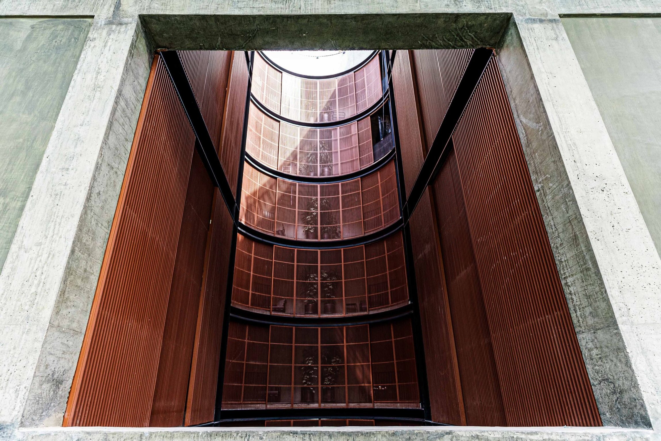 This Sleek New Boutique Hotel in Mexico City Sits Next to Iconic Landmarks in Cuauhtémoc | VOLGA Mexico City stairway | VOLGA Mexico City outdoor pool | VOLGA Mexico City city view | VOLGA Mexico City hallway | VOLGA Mexico City bedroom suite | VOLGA Mexico City bathroom | VOLGA Mexico City outdoor seating | VOLGA Mexico City dance club