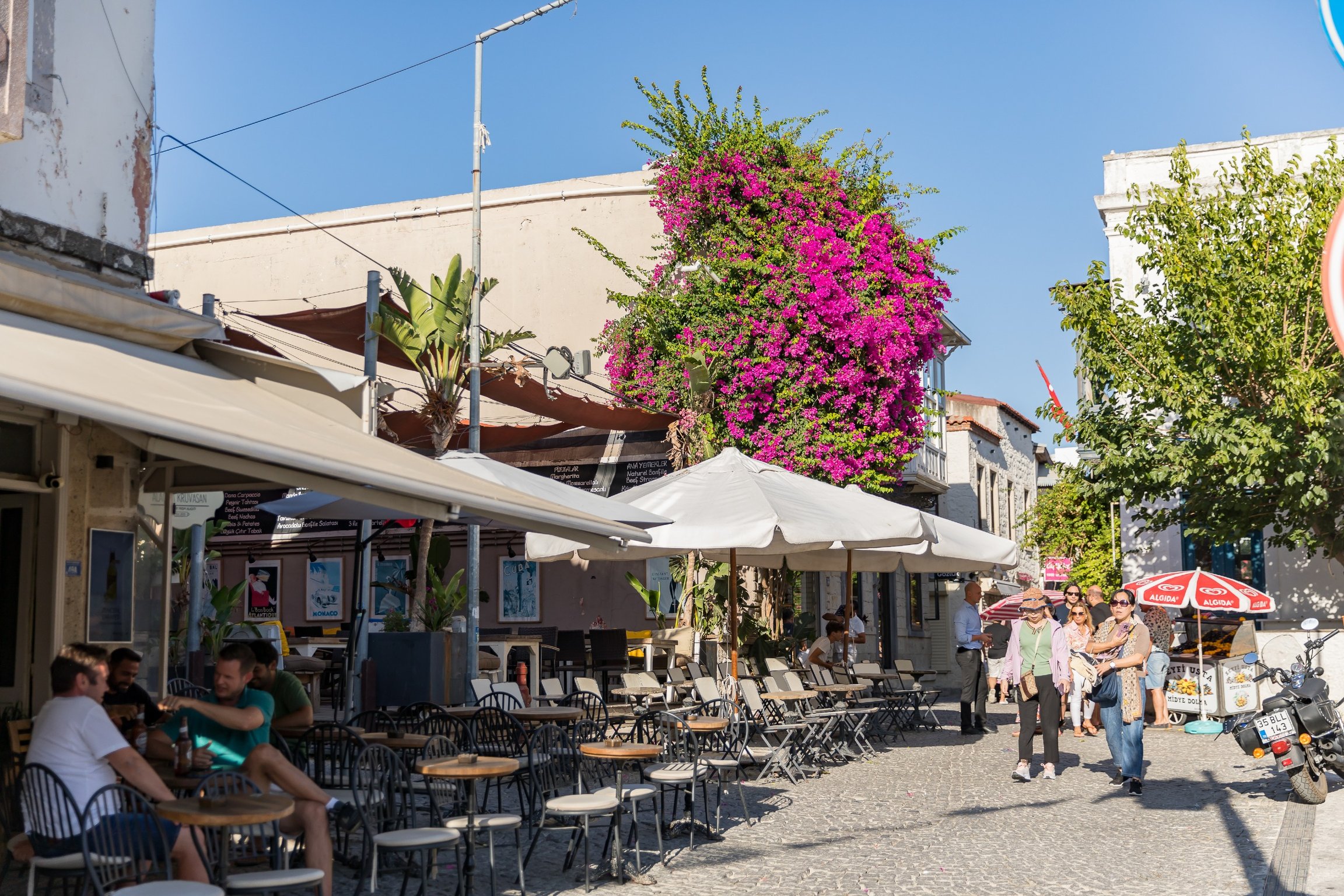 Have You Ever Heard of Alaçatı? | KestelINN exterior in the town of Alaçatı Turkey | KestelINN cozy bedroom suite | KestelINN bedroom bathroom | Steps leading into the KestelINN