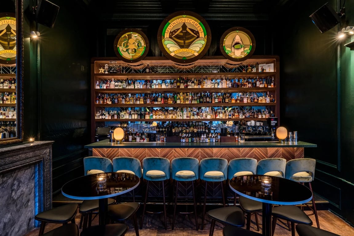 The 9 Best Cocktail Bars in Amsterdam | Flying-Dutchmen-Cocktails | Door-74 | Hiding-in-Plain-Sight | Pulitzers-Bar | Freddys-Bar | Vesper-Bar-Photo-Credit_-Gino-van-Meenen | Rosalias-Menagerie | Bar-Oldenhof | Tales-Spirits