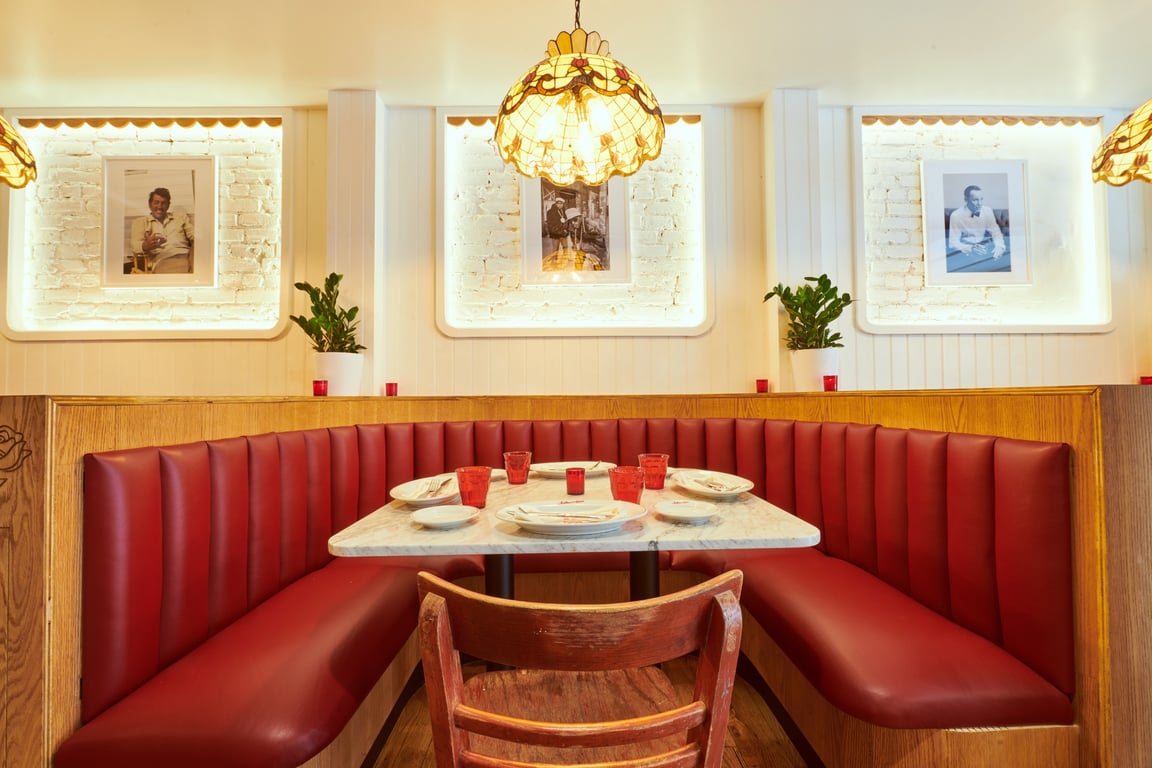 This Italian Restaurant in New York City’s West Village Is Ideal for Sundar Dinners | Arthur & Sons restaurant seating | Arthur & Sons pasta plate | Arthur & Sons homemade meatballs and sauce | Arthur & Sons fish plate | Arthur & Sons vanilla ice cream dessert