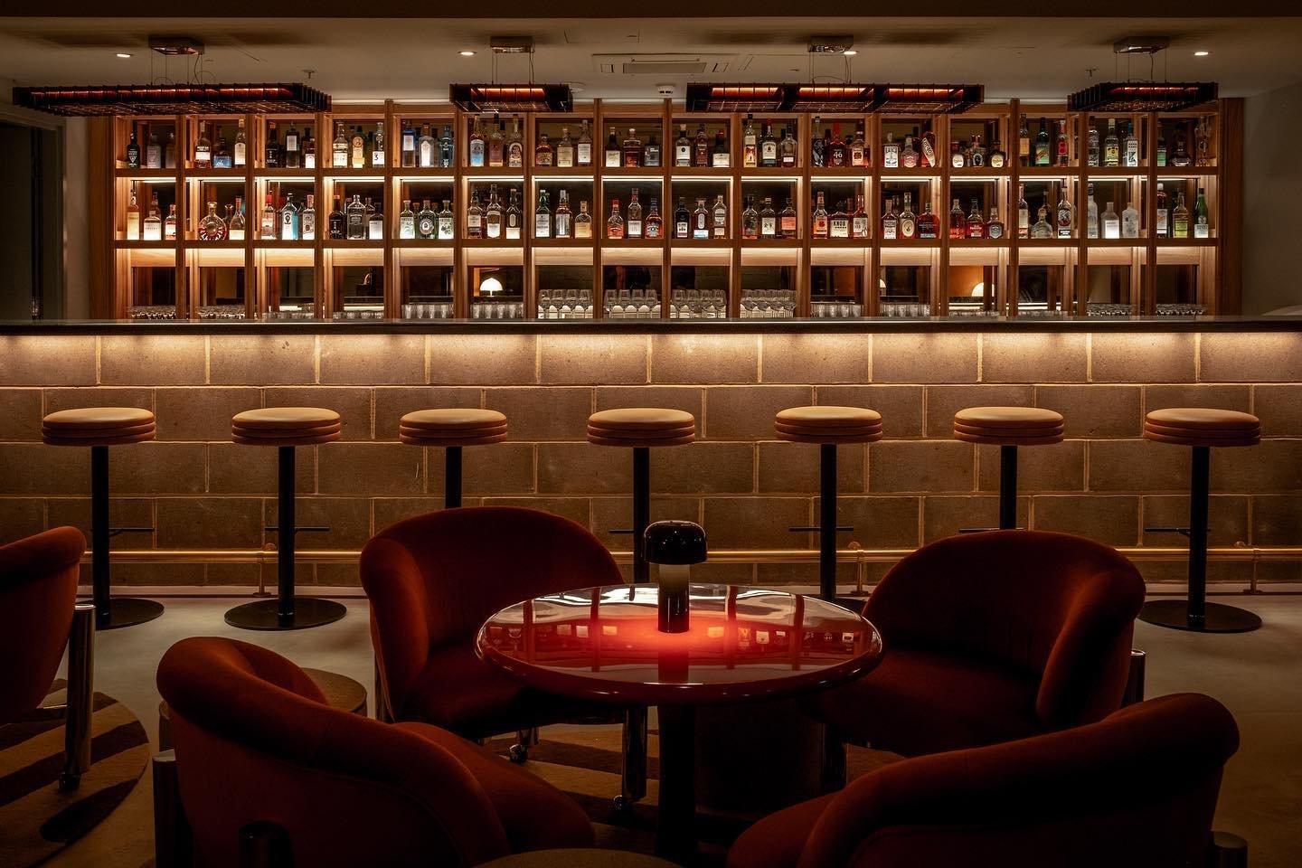 Discover Some of East London’s Hottest Spots Within This Hotel in Shoreditch | One Hundred Shoreditch bar | One Hundred Shoreditch evening on the balcony | One Hundred Shoreditch bedroom suite | One Hundred Shoreditch suite living room