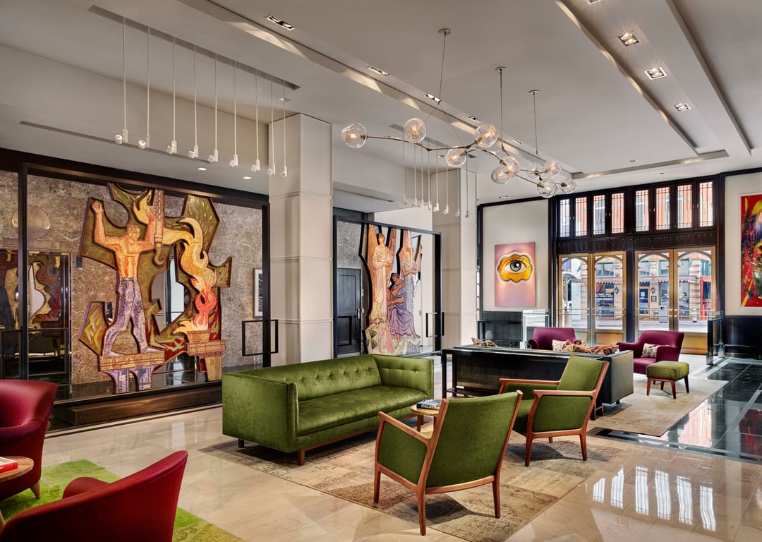 The Joule Dallas Is A Perfect Getaway For Art-Lovers and Foodies Alike | The Joule Dallas exterior view | The Joule Dallas bedroom suite | The Joule Dallas restaurant | The Joule Dallas bar | The Joule Dallas outdoor pool