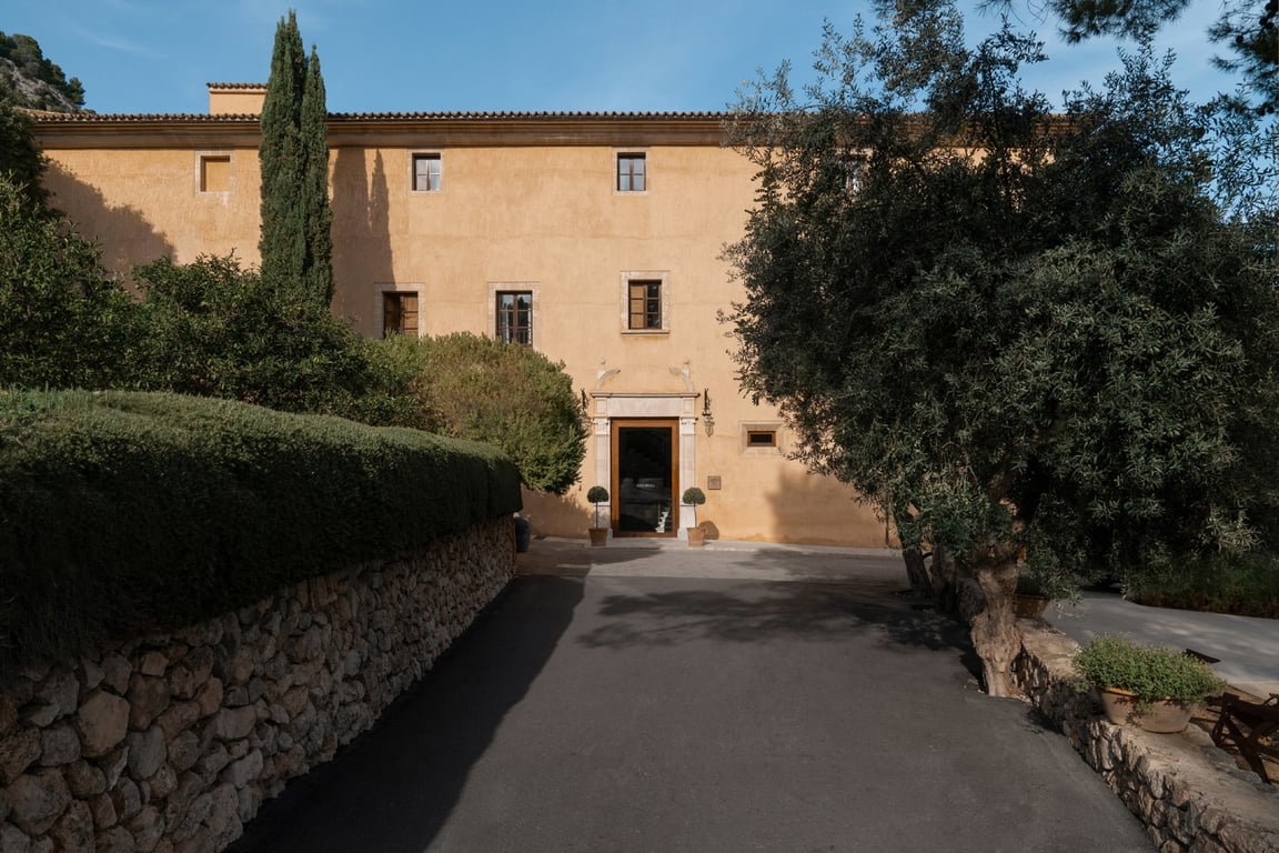This Renovated Monastery Is Mallorca’s Most Tranquil Retreat | Son Brull Mallorca exterior | Son Brull Mallorca entrance | Son Brull Mallorca seating | Son Brull Mallorca outdoor pool | Son Brull Mallorca spa | Son Brull hiking in Mallorca
