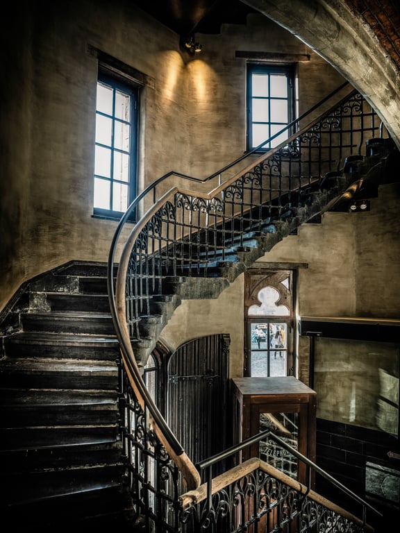 This Boutique Hotel Inside Ghent's Historic Post Office Building Delivers a First-Class Experience | 1898-The-Post-Entrance | 1898-The-Post-The-Loft | 1898-The-Post-Honesty-Bar | 1898-The-Post-The-Kitchen