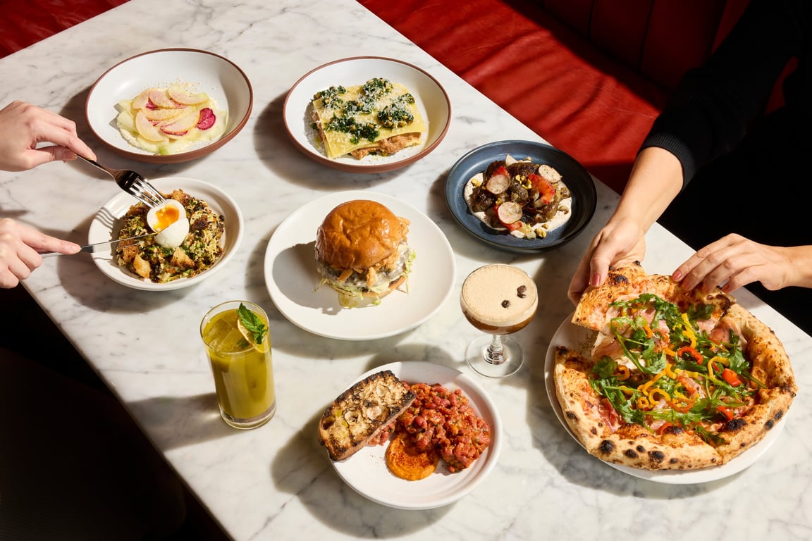 This Williamsburg Hotel Just Unveiled Its Newest Dining Concept | Sungold hotel restaurant chef making pizza | Sungold hotel restaurant interior seating | Sungold hotel restaurant pasta coperta dish | Sungold hotel restaurant side of sunchockes