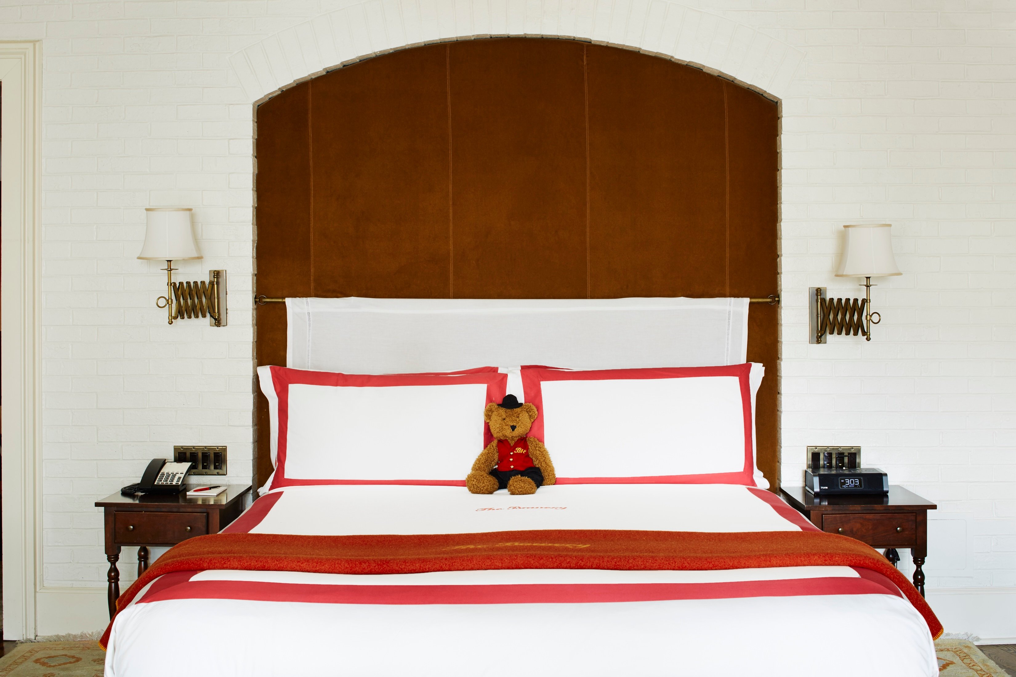 A made bed at the bowery hotel