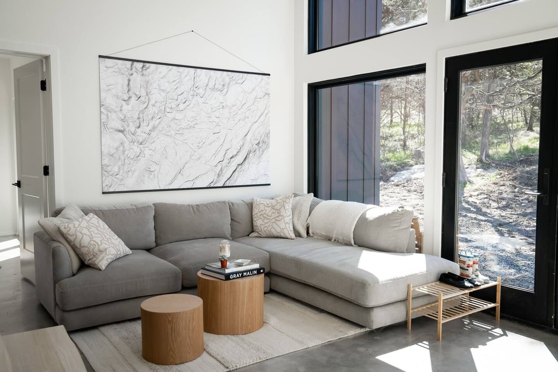 Escape the East Coast Summer Heat at This Modern Catskills Cabin Retreat | Minnewaska Hus suite entrance | Minnewaska Hus suite exterior | Minnewaska Hus suite living room | Minnewaska Hus bedroom | Minnewaska Hus suite bathroom
