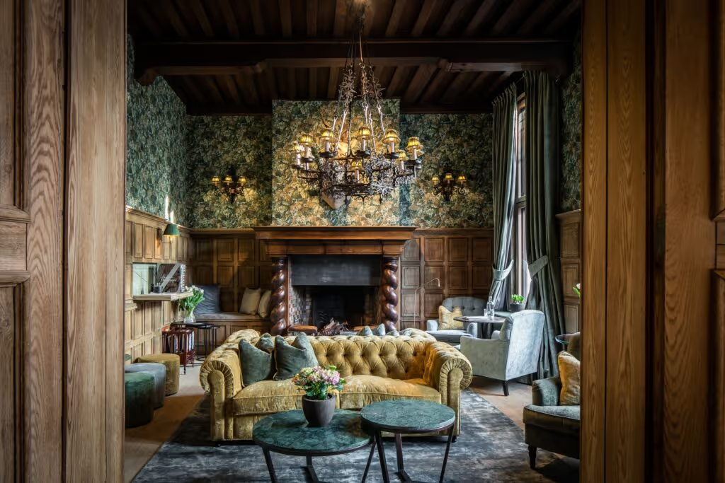 Hotel de Orangerie lobby | Hotel de Orangerie bedroom suite | Hotel de Orangerie rooftop suite | Hotel de Orangerie blue bedroom | Hotel de Orangerie fireplace | Hotel de Orangerie exterior | Hotel de Orangerie green bedroom suite