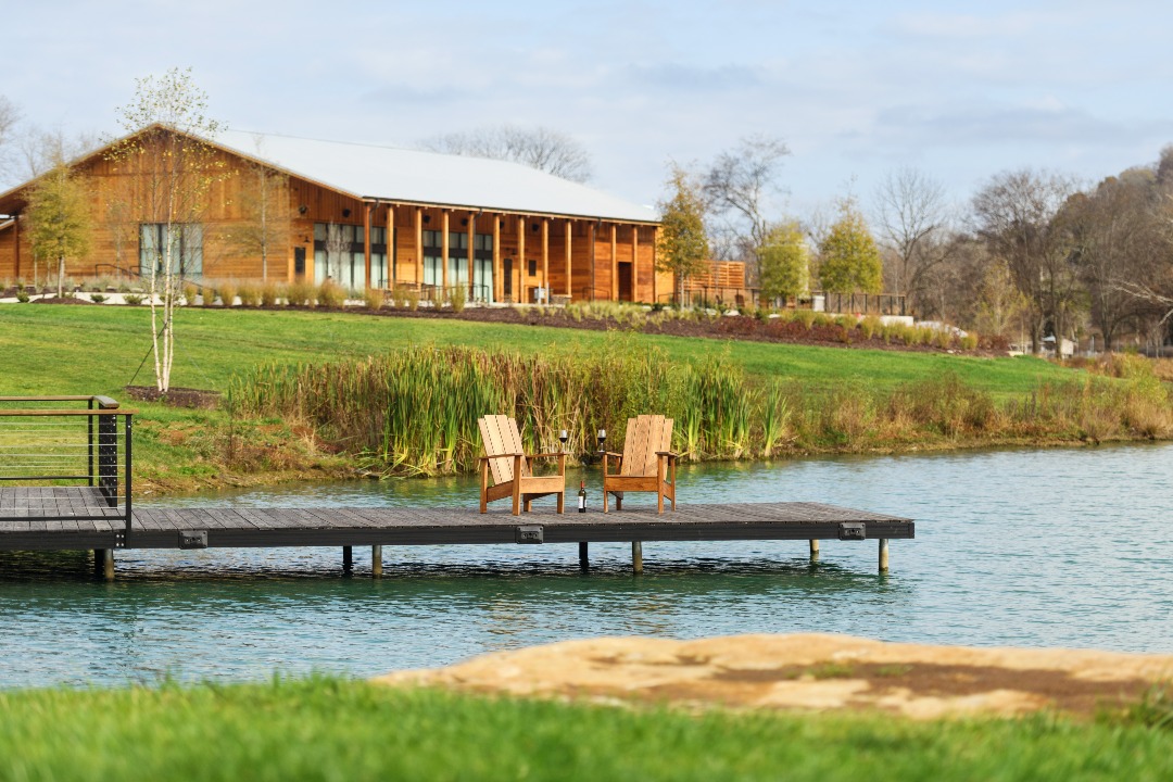 This Inn Unveils a New Era of Luxury Hospitality in the Rolling Hills of Middle Tennessee | Southall Inn & Farm Exterior of Event Center and Lake Mishkin | Southall Inn & Farm Hillside One-Bedroom Cottage | Southall Inn & Farm pool | Southall Inn & Farm exterior view