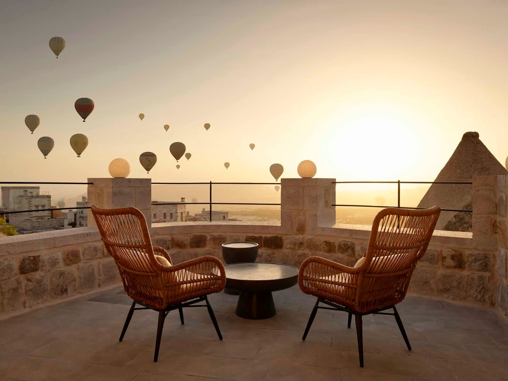 Argos in Cappadocia terrace with views of fairy chimneys and hot air balloons