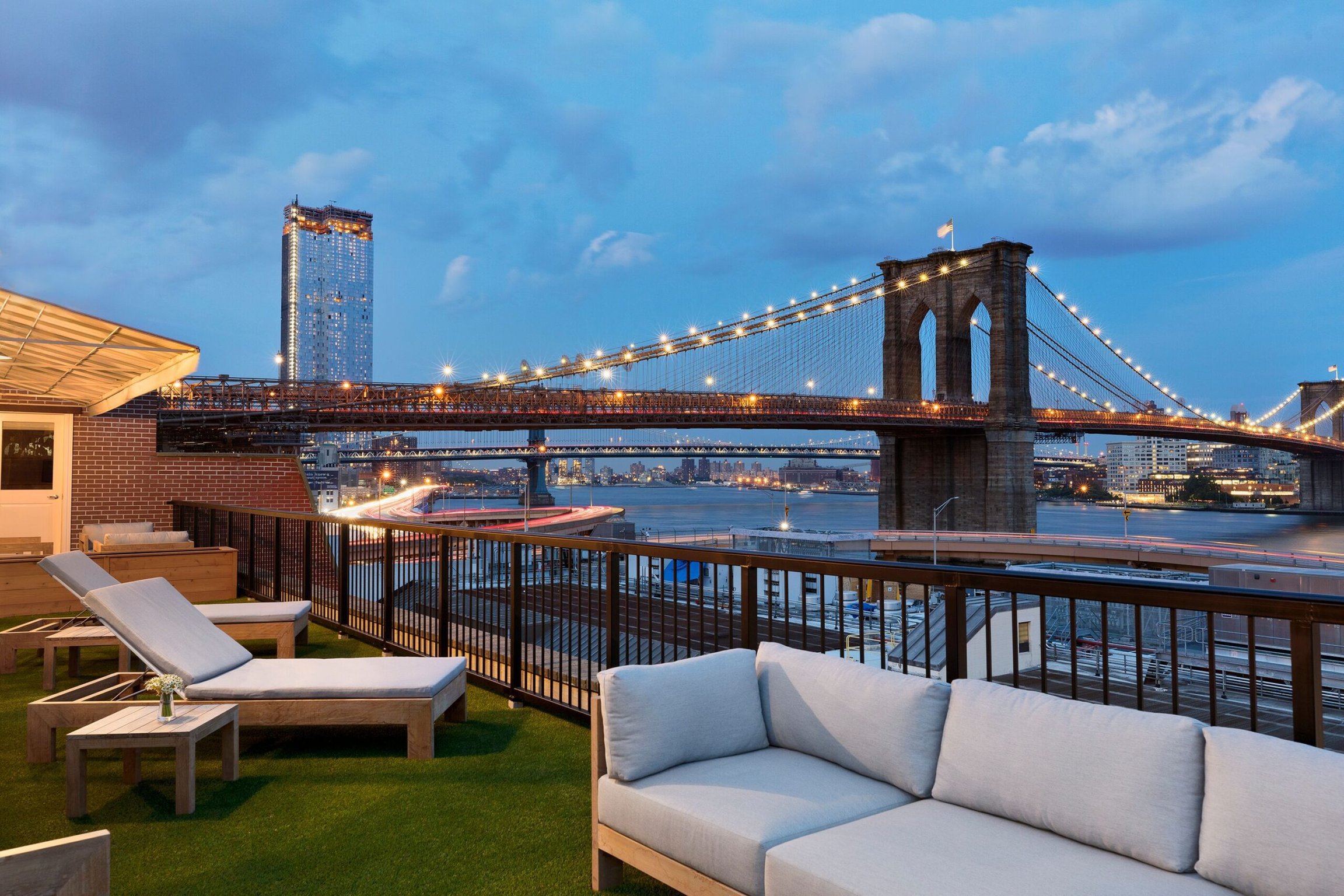 33 Seaport Hotel Terrace-Brooklyn-Bridge-View | 33-Seaport-Hotel-Exterior | 33 Seaport Hotel suite bedroom | 33 Seaport Hotel Restaurant Pearl corner by bar