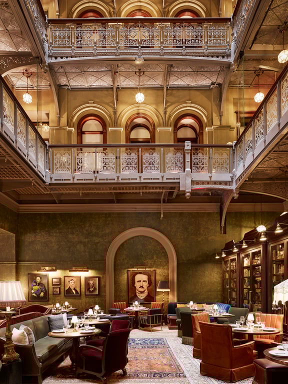 Hotel Review: The Beekman, A Thompson Hotel | The Beekman exterior | The Beekman stair case view | The Beekman lobby | The Beekman bedroom | The Beekman suite | The Beekman deck seating | The Beekman outdoor restaurant seating | The Beekman restaurant seating | The Beekman restaurant