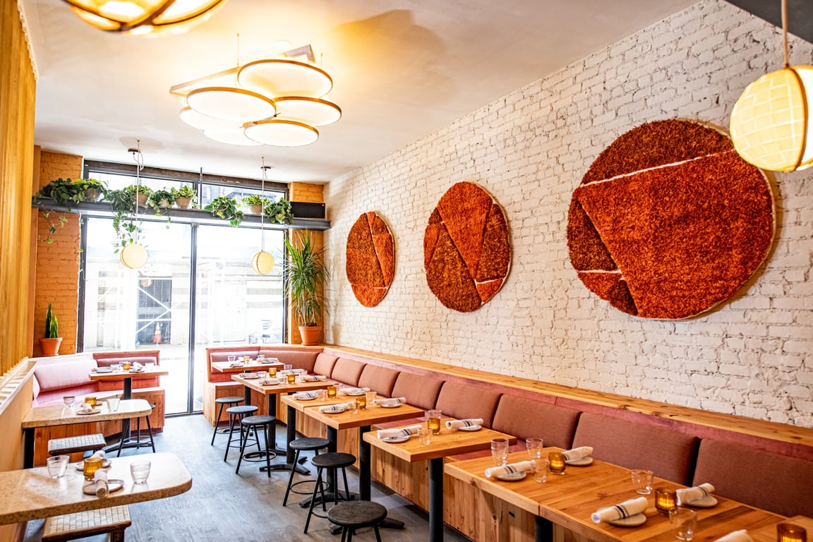 This Lauded Former Williamsburg Bar Reopens in NYC’s West Village | Donna bar and restaurant seating | Donna bar seating | Donna bar food | Donna bar drinks