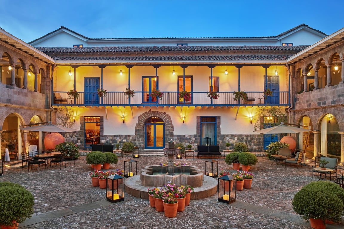 This Boutique Hotel in Cusco Connects to Old-Age Peruvian Culture | Palacio del Inka, a Luxury Collection Hotel, Cusco entrance | Palacio del Inka, a Luxury Collection Hotel, Cusco archway | Palacio del Inka, a Luxury Collection Hotel, Cusco lobby | Palacio del Inka, a Luxury Collection Hotel, Cusco bedroom | Palacio del Inka, a Luxury Collection Hotel, Cusco indoor spa | Palacio del Inka, a Luxury Collection Hotel, Cusco courtyard | Palacio del Inka, a Luxury Collection Hotel, Cusco restaurant | Palacio del Inka, a Luxury Collection Hotel, Cusco person walking