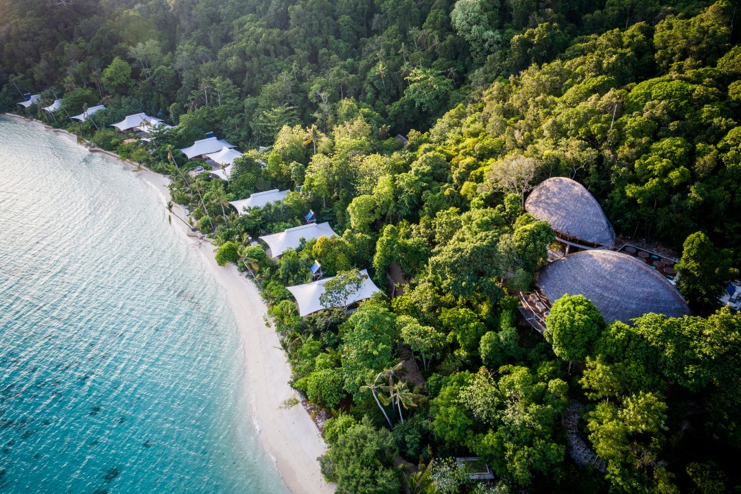Bawah Reserve bird's eye view | Bawah Reserve island view | Bawah Reserve sunset view | Bawah Reserve aerial view | Bawah Reserve bedroom | Bawah Reserve bar | Bawah Reserve restaurant | Bawah Reserve turtle watching | This Private Island Resort Off Singapore Is Like A Mini-Maldives
