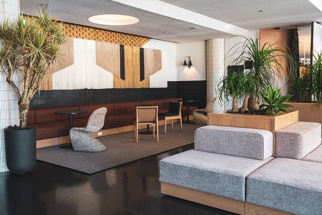 The Emily Hotel lobby | This Chicago Boutique Hotel Invites Travelers to the West Loop’s Fulton Market Area | The Emily Hotel Fora restaurant | The Emily Hotel bedroom suite