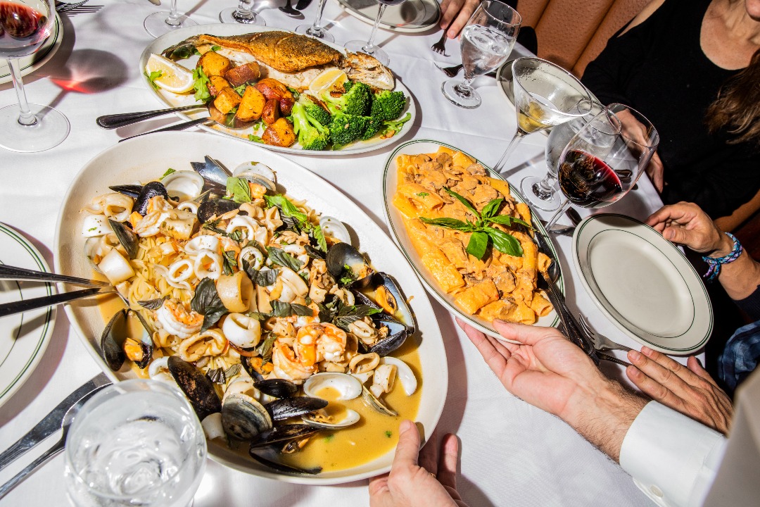 Tony's Di Napoli hearty dinner meal | Tony's Di Napoli restaurant menu | Tony's Di Napoli restaurant decor | Tony's Di Napoli signature dish | Tony's Di Napoli salad | Tony's Di Napoli dessert | Tony's Di Napoli espresso martini | This Classic New York Italian Eatery Boasts Timeless Old-School Vibes