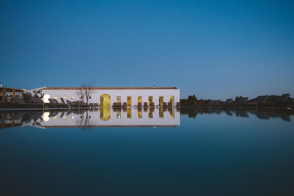 Escape to this Rustic Countryside Retreat With Fruit Orchards, Animals, and Contemporary Farmhouse Cottages in Alentejo