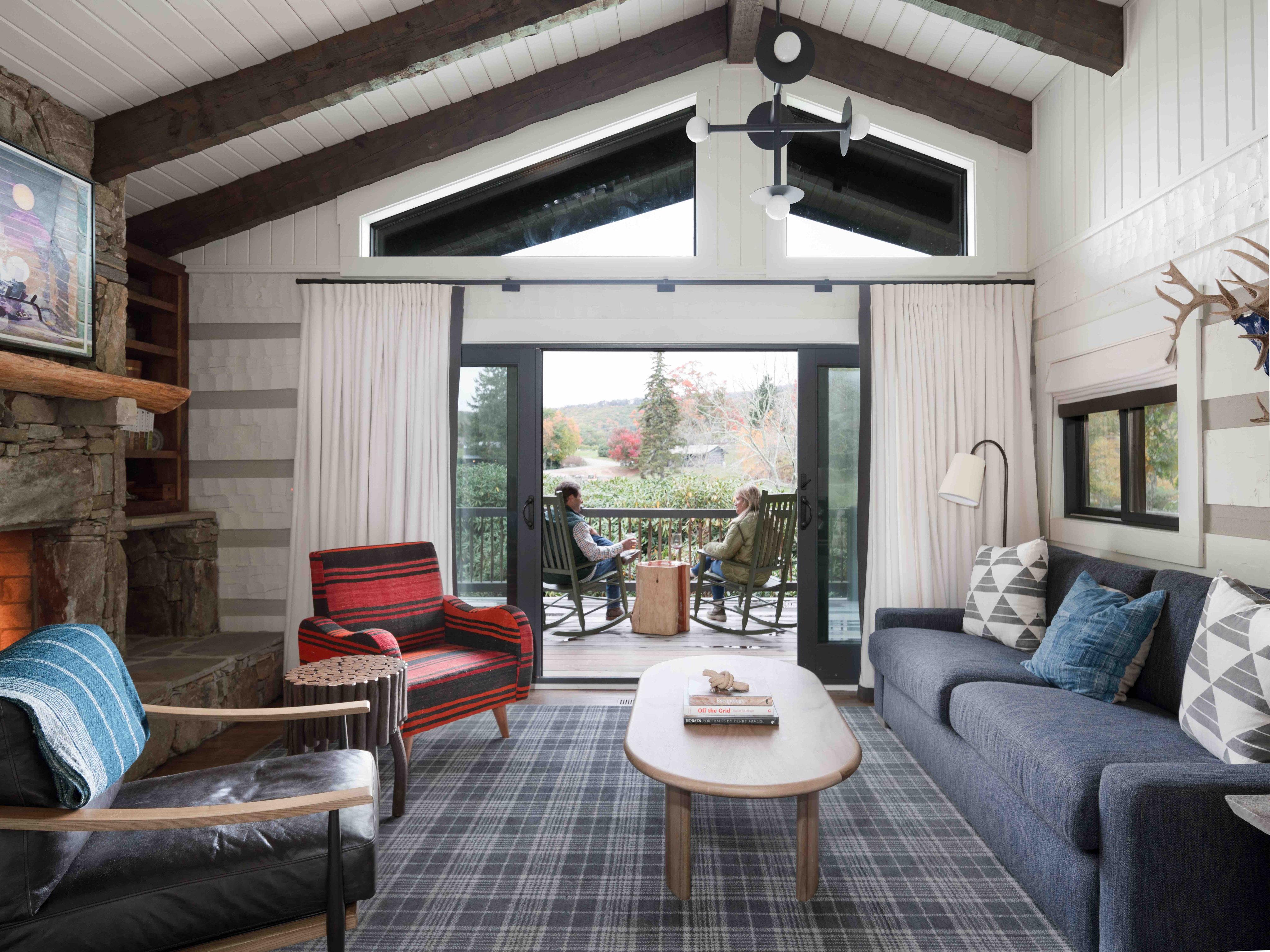 A cabin with textile rugs at Cataloochee Ranch