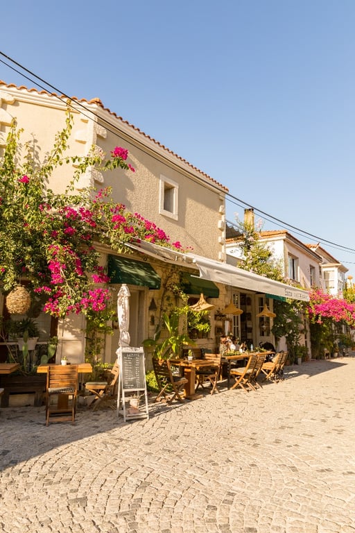 Have You Ever Heard of Alaçatı? | KestelINN exterior in the town of Alaçatı Turkey | KestelINN cozy bedroom suite | KestelINN bedroom bathroom | Steps leading into the KestelINN