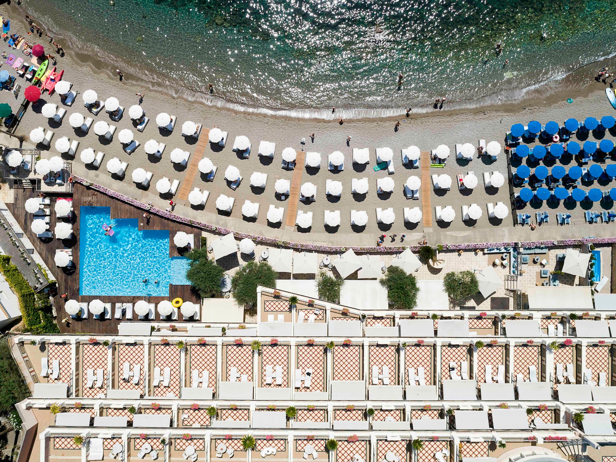Mazzarò Sea Palace beach chairs and pool deck