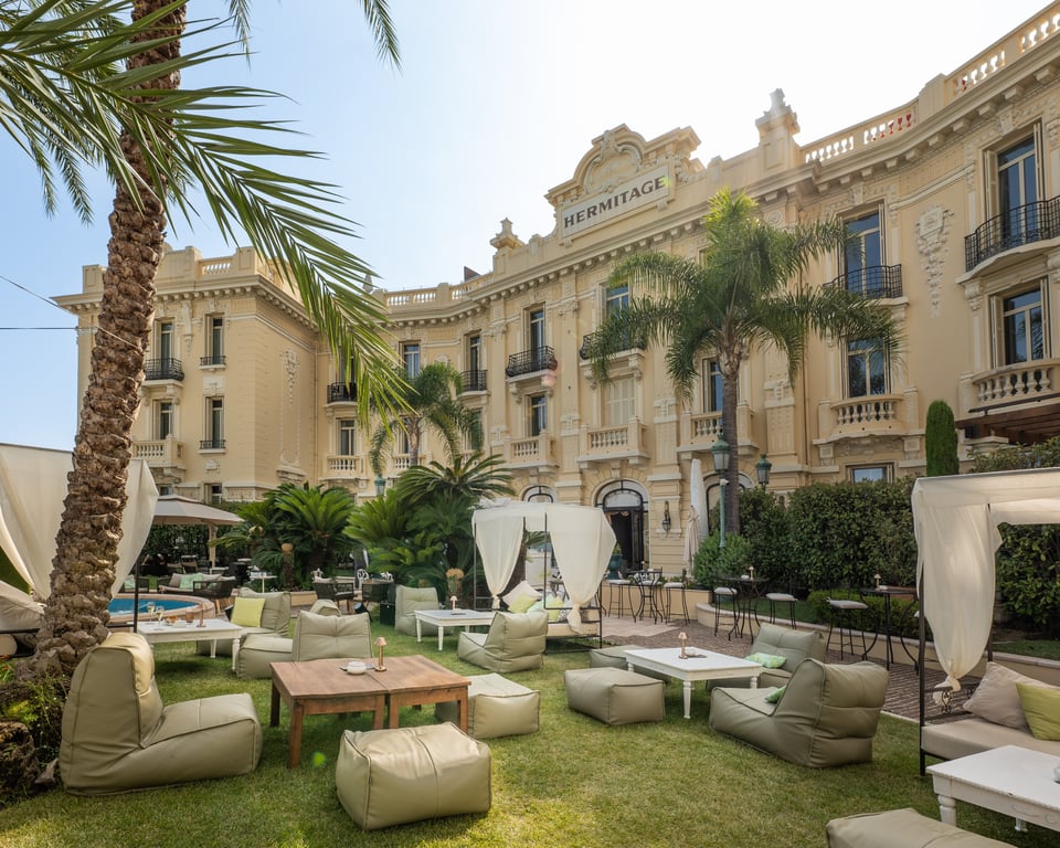 This Monaco Boutique Hotel Is Luxe, Exquisite, and Host to a Building Designed by the Same Man Who Constructed the Eiffel Tower | Hotel Hermitage Monte-Carlo jardin d'hiver | Hotel Hermitage Monte-Carlo dining | Hotel Hermitage Monte-Carlo yachts | Hotel Hermitage Monte-Carlo suite